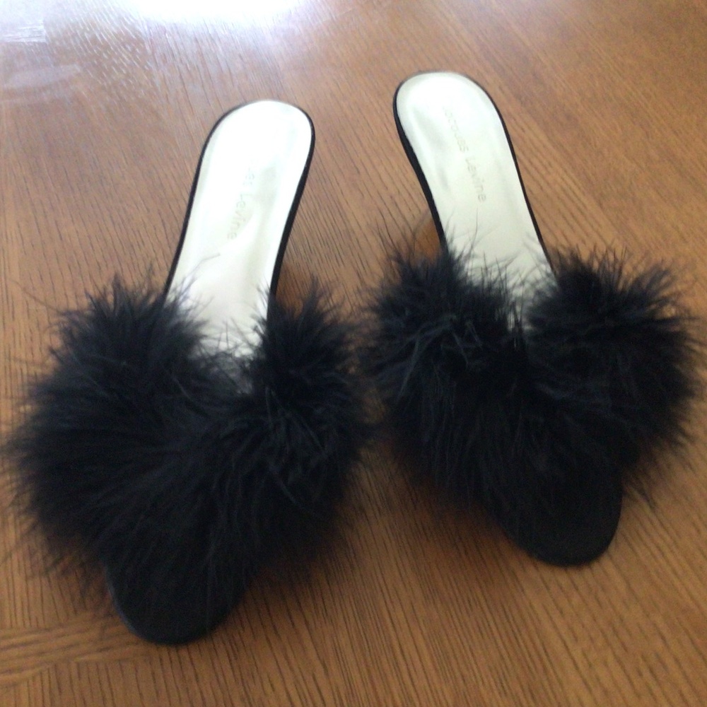 Black Maribou slides, size 9.  Worn for a show but still in great condition.